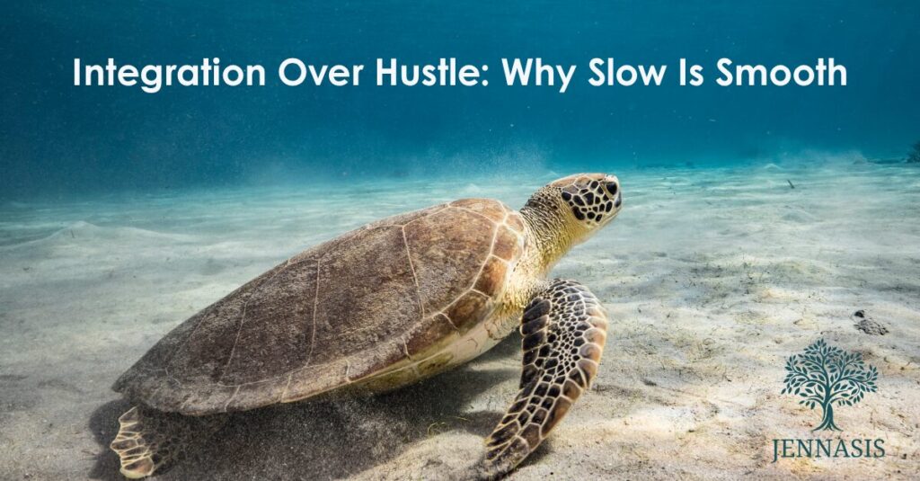 Turtle swimming on ocean floor with white text at the top reading, "Integration Over Hustle: Why Slow Is Smooth"